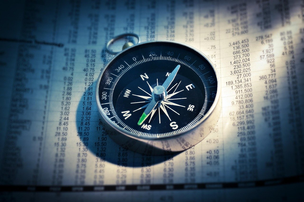 compass newspaper finance direction